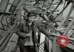 Image of German civilians cross severely damaged bridge over Elbe River Tangermunde Germany, 1945, second 45 stock footage video 65675077887