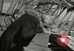 Image of German civilians cross severely damaged bridge over Elbe River Tangermunde Germany, 1945, second 49 stock footage video 65675077887