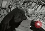 Image of German civilians cross severely damaged bridge over Elbe River Tangermunde Germany, 1945, second 50 stock footage video 65675077887