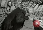 Image of German civilians cross severely damaged bridge over Elbe River Tangermunde Germany, 1945, second 53 stock footage video 65675077887