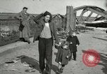 Image of German civilians cross severely damaged bridge over Elbe River Tangermunde Germany, 1945, second 56 stock footage video 65675077887