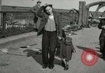 Image of German civilians cross severely damaged bridge over Elbe River Tangermunde Germany, 1945, second 59 stock footage video 65675077887