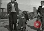 Image of German civilians cross severely damaged bridge over Elbe River Tangermunde Germany, 1945, second 62 stock footage video 65675077887