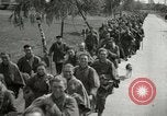 Image of German soldiers on American side of Elbe River at end of World War 2 Tangermunde Germany, 1945, second 20 stock footage video 65675077888