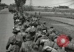 Image of German soldiers on American side of Elbe River at end of World War 2 Tangermunde Germany, 1945, second 26 stock footage video 65675077888