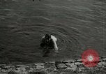 Image of German soldiers on American side of Elbe River at end of World War 2 Tangermunde Germany, 1945, second 31 stock footage video 65675077888