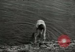 Image of German soldiers on American side of Elbe River at end of World War 2 Tangermunde Germany, 1945, second 36 stock footage video 65675077888