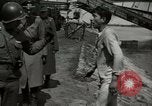 Image of German soldiers on American side of Elbe River at end of World War 2 Tangermunde Germany, 1945, second 39 stock footage video 65675077888