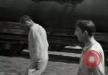 Image of German soldiers on American side of Elbe River at end of World War 2 Tangermunde Germany, 1945, second 48 stock footage video 65675077888