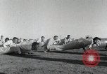 Image of Aviation cadets do supervised physical exercise San Antonio Texas USA, 1950, second 13 stock footage video 65675077922
