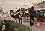 Image of American visitor Philippines, 1971, second 15 stock footage video 65675078057