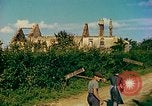 Image of burned buildings France, 1944, second 56 stock footage video 65675078073
