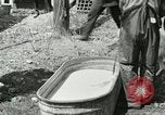 Image of worker washes a dog on Circus camp ground United States USA, 1919, second 5 stock footage video 65675078135