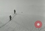 Image of Men walk carefully on frozen Niagara River New York United States USA, 1919, second 3 stock footage video 65675078137