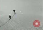 Image of Men walk carefully on frozen Niagara River New York United States USA, 1919, second 4 stock footage video 65675078137