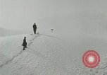 Image of Men walk carefully on frozen Niagara River New York United States USA, 1919, second 6 stock footage video 65675078137