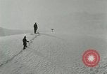 Image of Men walk carefully on frozen Niagara River New York United States USA, 1919, second 7 stock footage video 65675078137