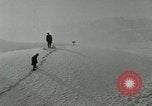 Image of Men walk carefully on frozen Niagara River New York United States USA, 1919, second 8 stock footage video 65675078137