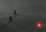 Image of Men walk carefully on frozen Niagara River New York United States USA, 1919, second 9 stock footage video 65675078137