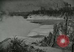 Image of Men walk carefully on frozen Niagara River New York United States USA, 1919, second 11 stock footage video 65675078137