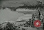 Image of Men walk carefully on frozen Niagara River New York United States USA, 1919, second 13 stock footage video 65675078137