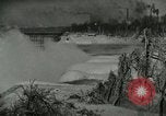 Image of Men walk carefully on frozen Niagara River New York United States USA, 1919, second 16 stock footage video 65675078137