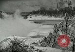 Image of Men walk carefully on frozen Niagara River New York United States USA, 1919, second 19 stock footage video 65675078137