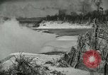 Image of Men walk carefully on frozen Niagara River New York United States USA, 1919, second 22 stock footage video 65675078137