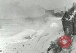 Image of Men walk carefully on frozen Niagara River New York United States USA, 1919, second 23 stock footage video 65675078137