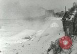 Image of Men walk carefully on frozen Niagara River New York United States USA, 1919, second 25 stock footage video 65675078137