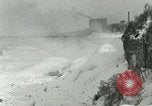 Image of Men walk carefully on frozen Niagara River New York United States USA, 1919, second 27 stock footage video 65675078137