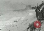 Image of Men walk carefully on frozen Niagara River New York United States USA, 1919, second 28 stock footage video 65675078137
