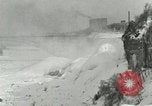 Image of Men walk carefully on frozen Niagara River New York United States USA, 1919, second 29 stock footage video 65675078137