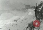 Image of Men walk carefully on frozen Niagara River New York United States USA, 1919, second 32 stock footage video 65675078137