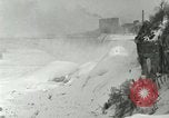 Image of Men walk carefully on frozen Niagara River New York United States USA, 1919, second 33 stock footage video 65675078137