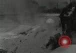 Image of Men walk carefully on frozen Niagara River New York United States USA, 1919, second 38 stock footage video 65675078137