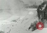 Image of Men walk carefully on frozen Niagara River New York United States USA, 1919, second 39 stock footage video 65675078137