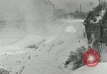 Image of Men walk carefully on frozen Niagara River New York United States USA, 1919, second 41 stock footage video 65675078137