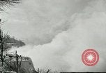 Image of Men walk carefully on frozen Niagara River New York United States USA, 1919, second 54 stock footage video 65675078137