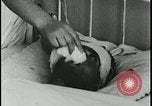 Image of Iranian Villager dying after being bitten by rabid wolf Iran, 1955, second 14 stock footage video 65675078246