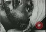 Image of Iranian Villager dying after being bitten by rabid wolf Iran, 1955, second 53 stock footage video 65675078246