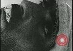 Image of Iranian Villager dying after being bitten by rabid wolf Iran, 1955, second 54 stock footage video 65675078246