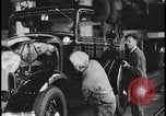 Image of Henry Ford with 1930's Ford sedans Dearborn Michigan USA, 1935, second 4 stock footage video 65675078249