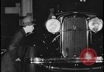 Image of Henry Ford with 1930's Ford sedans Dearborn Michigan USA, 1935, second 5 stock footage video 65675078249