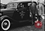 Image of Henry Ford with 1930's Ford sedans Dearborn Michigan USA, 1935, second 14 stock footage video 65675078249