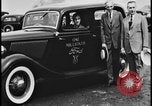 Image of Henry Ford with 1930's Ford sedans Dearborn Michigan USA, 1935, second 16 stock footage video 65675078249