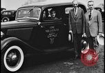 Image of Henry Ford with 1930's Ford sedans Dearborn Michigan USA, 1935, second 17 stock footage video 65675078249