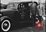 Image of Henry Ford with 1930's Ford sedans Dearborn Michigan USA, 1935, second 18 stock footage video 65675078249