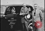 Image of Henry Ford with 1930's Ford sedans Dearborn Michigan USA, 1935, second 20 stock footage video 65675078249