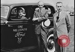 Image of Henry Ford with 1930's Ford sedans Dearborn Michigan USA, 1935, second 23 stock footage video 65675078249